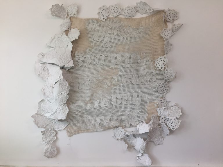 text based art, filet crochet dipped in latex
